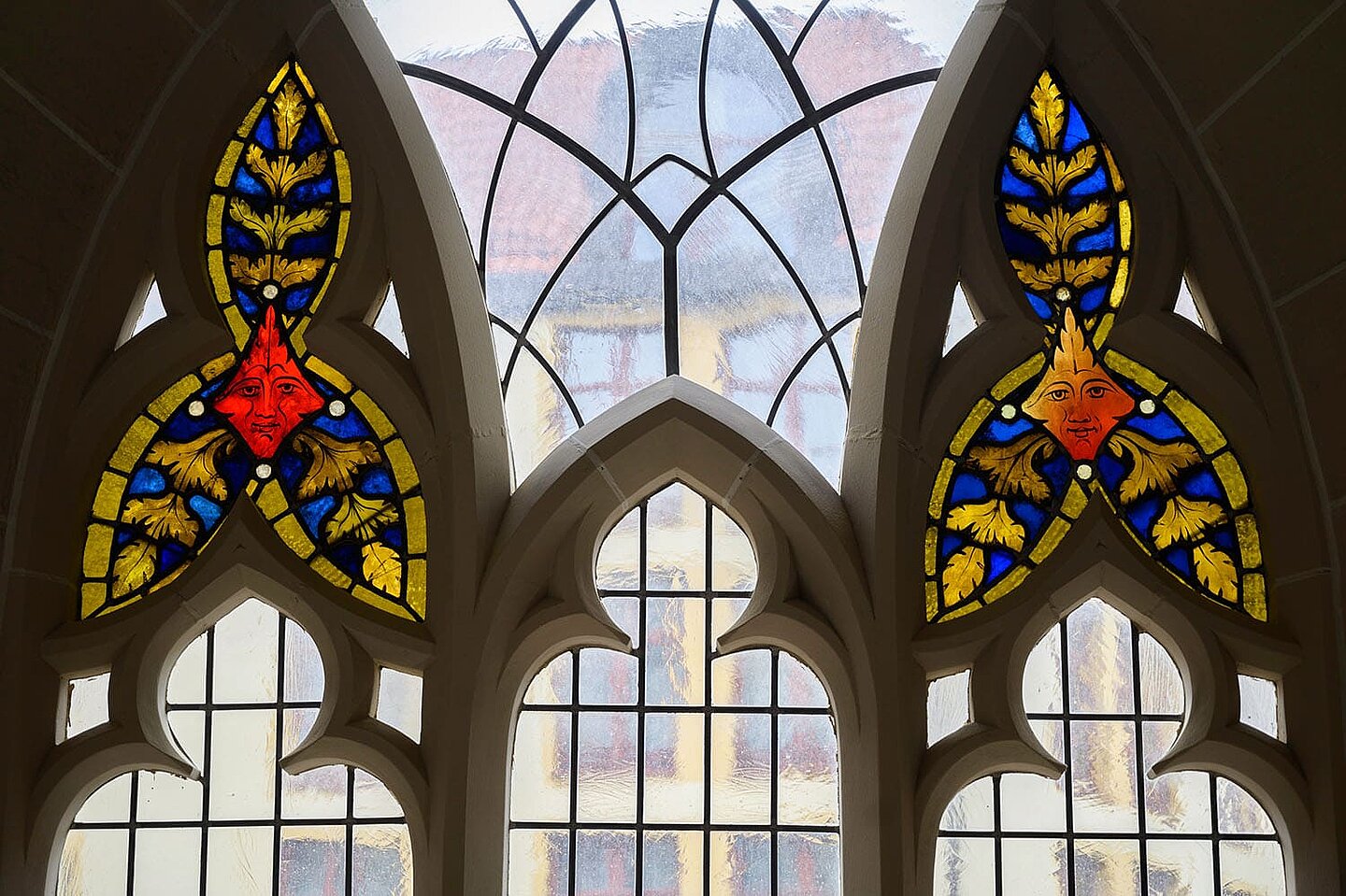 Colorful window glass of the Kaufmannskirche Erfurt